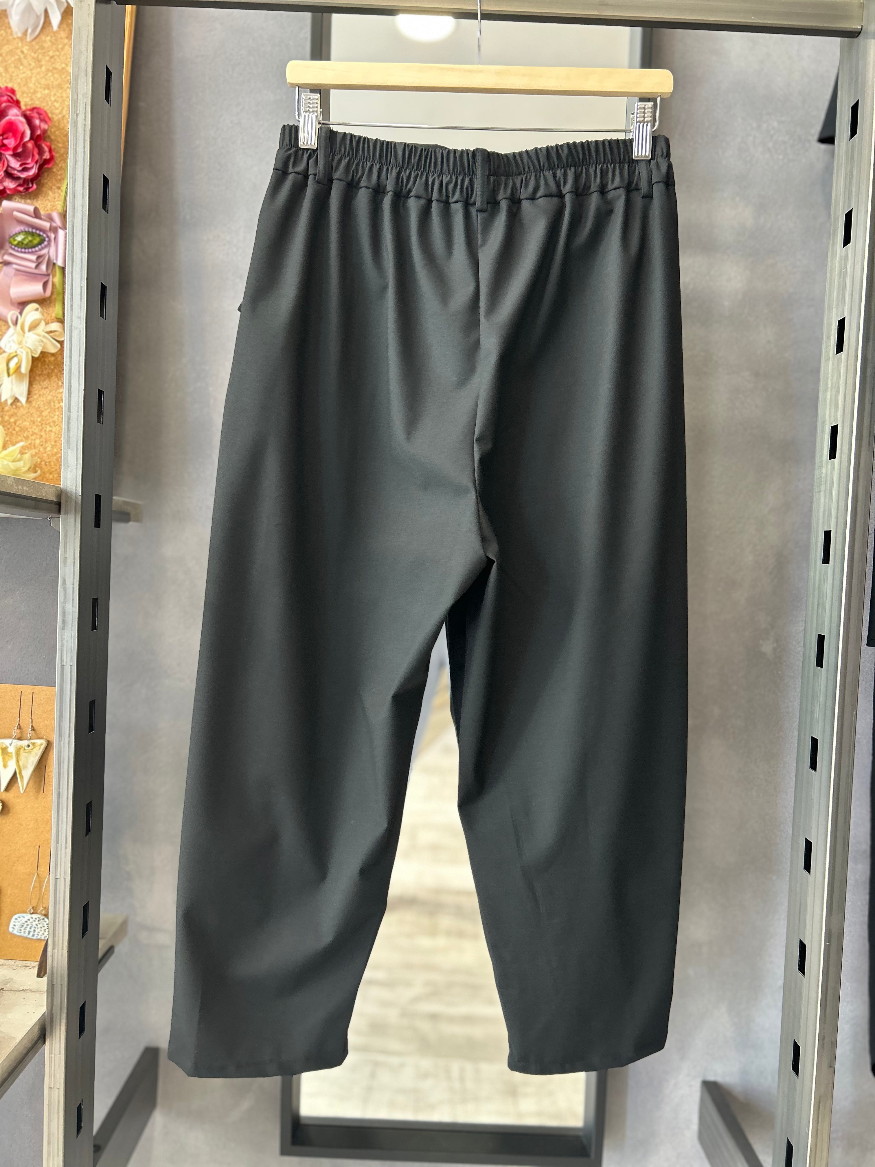 Pantaloni over con tasche