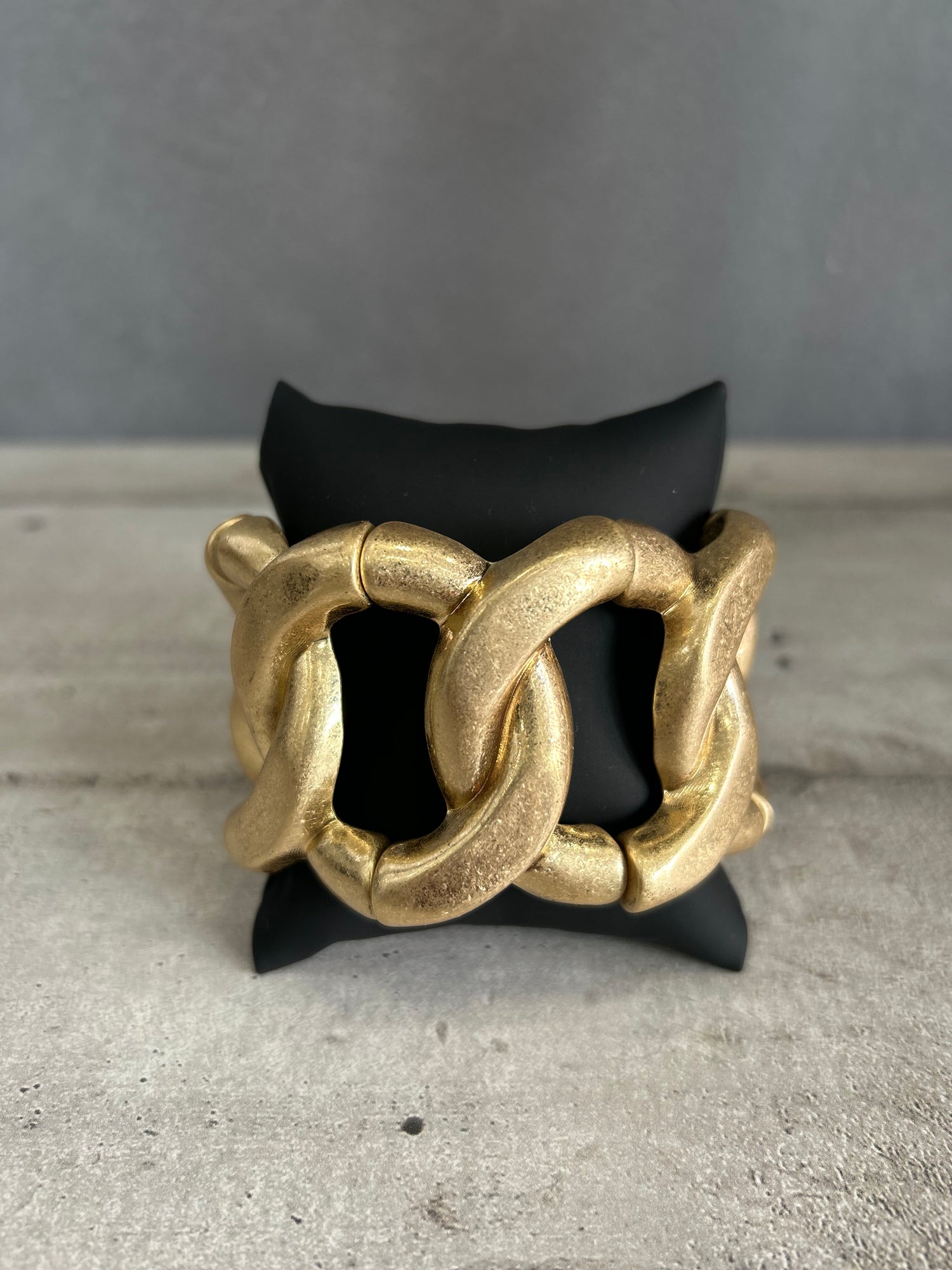Bracciale elastico a catena in metallo dorato