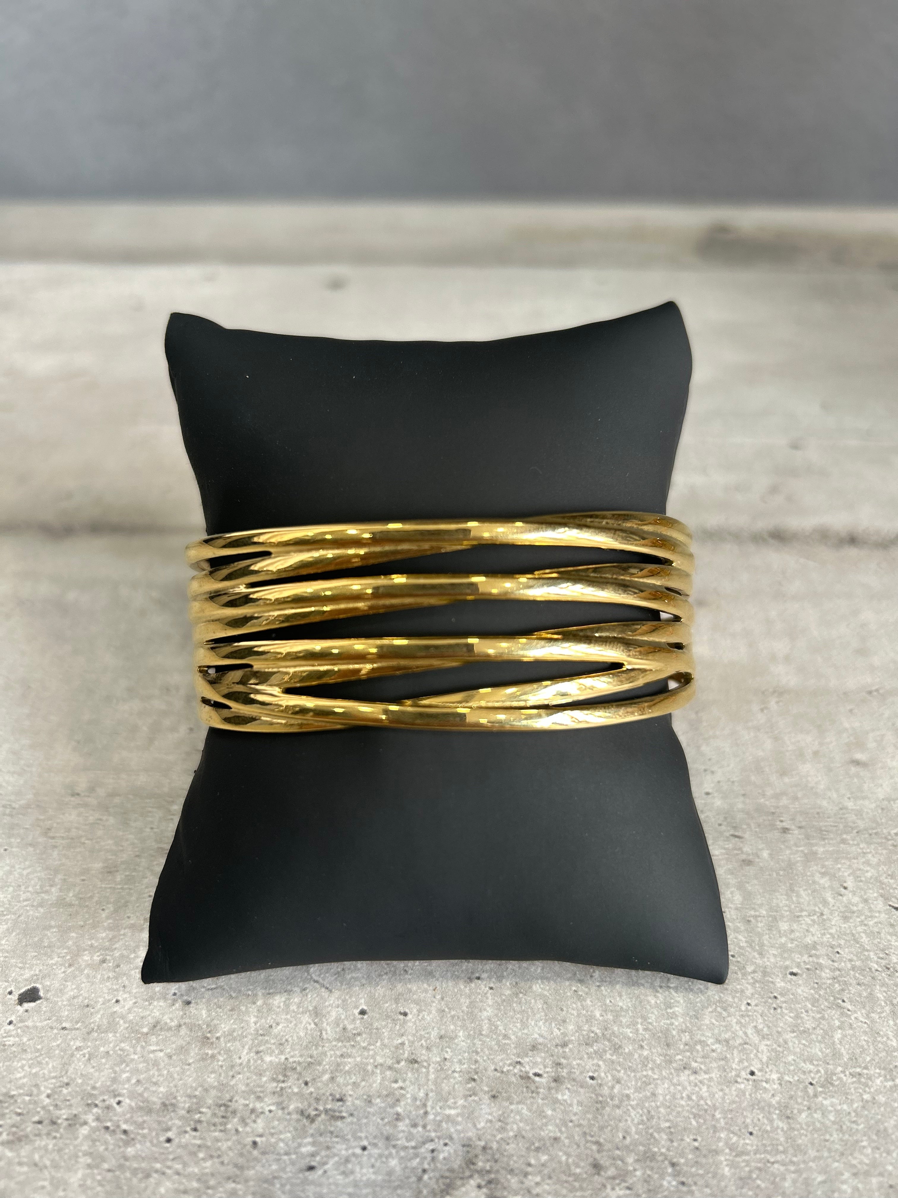 Bracciale rigido in acciaio dorato