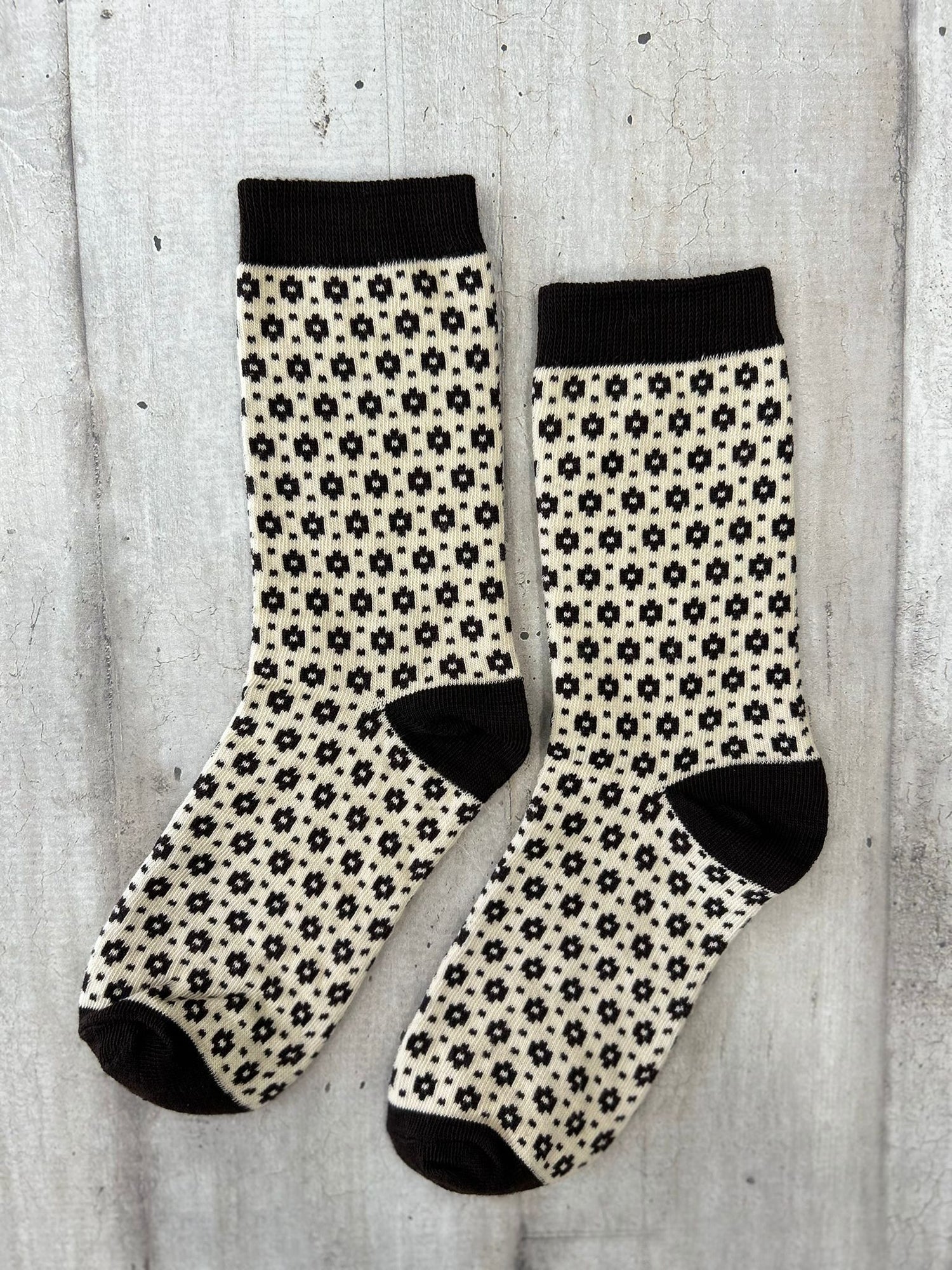 Calzini beige con motivo geometrico nero