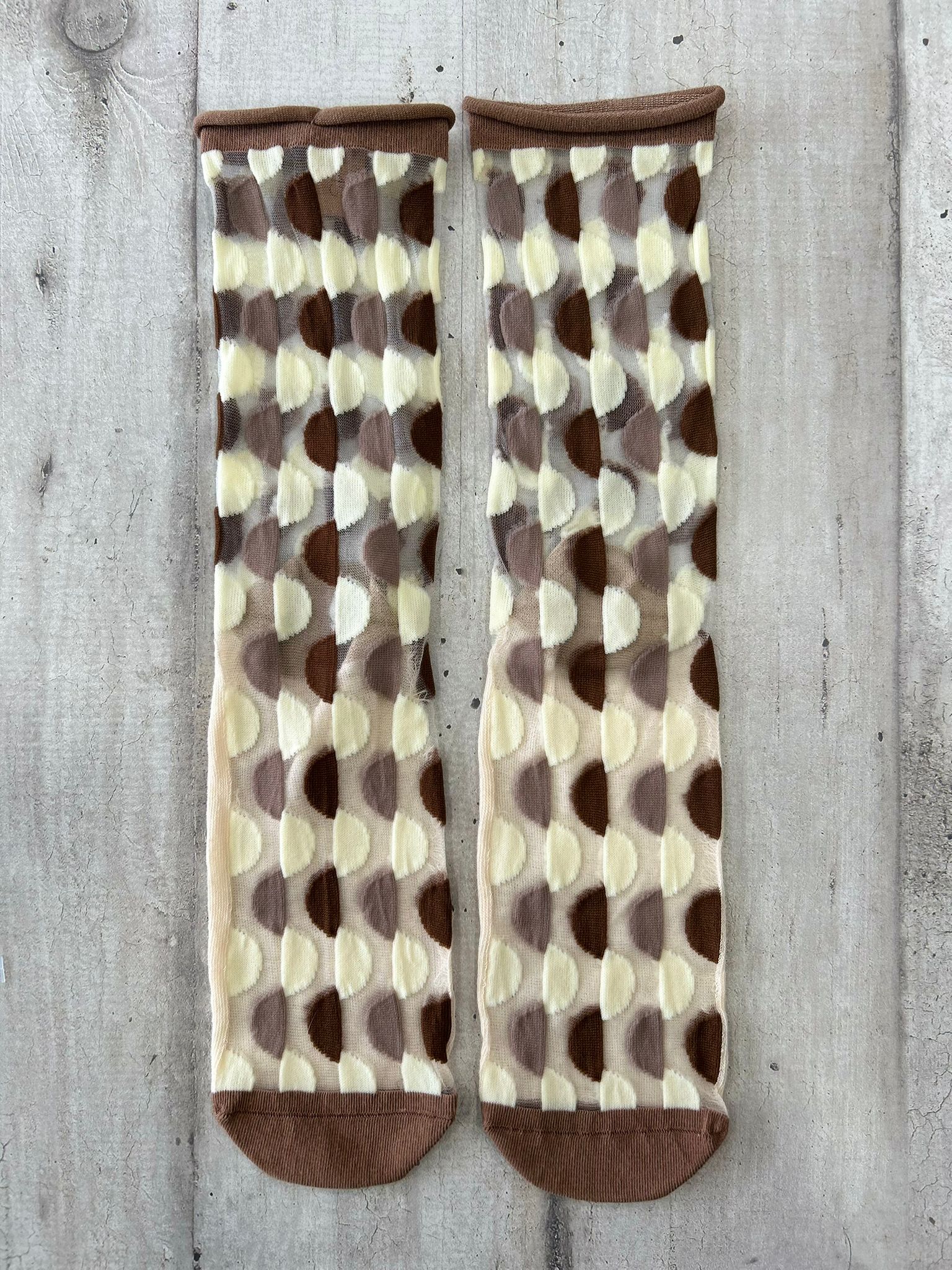 Calzini trasparenti con fantasia geometrica