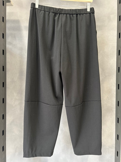 Pantaloni con zip laterale sul fondo