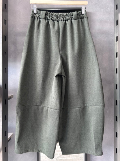 Pantaloni ampi con fantasia a spina di pesce