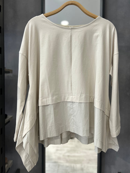 Maglia asimmetrica