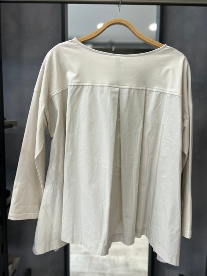 Maglia asimmetrica