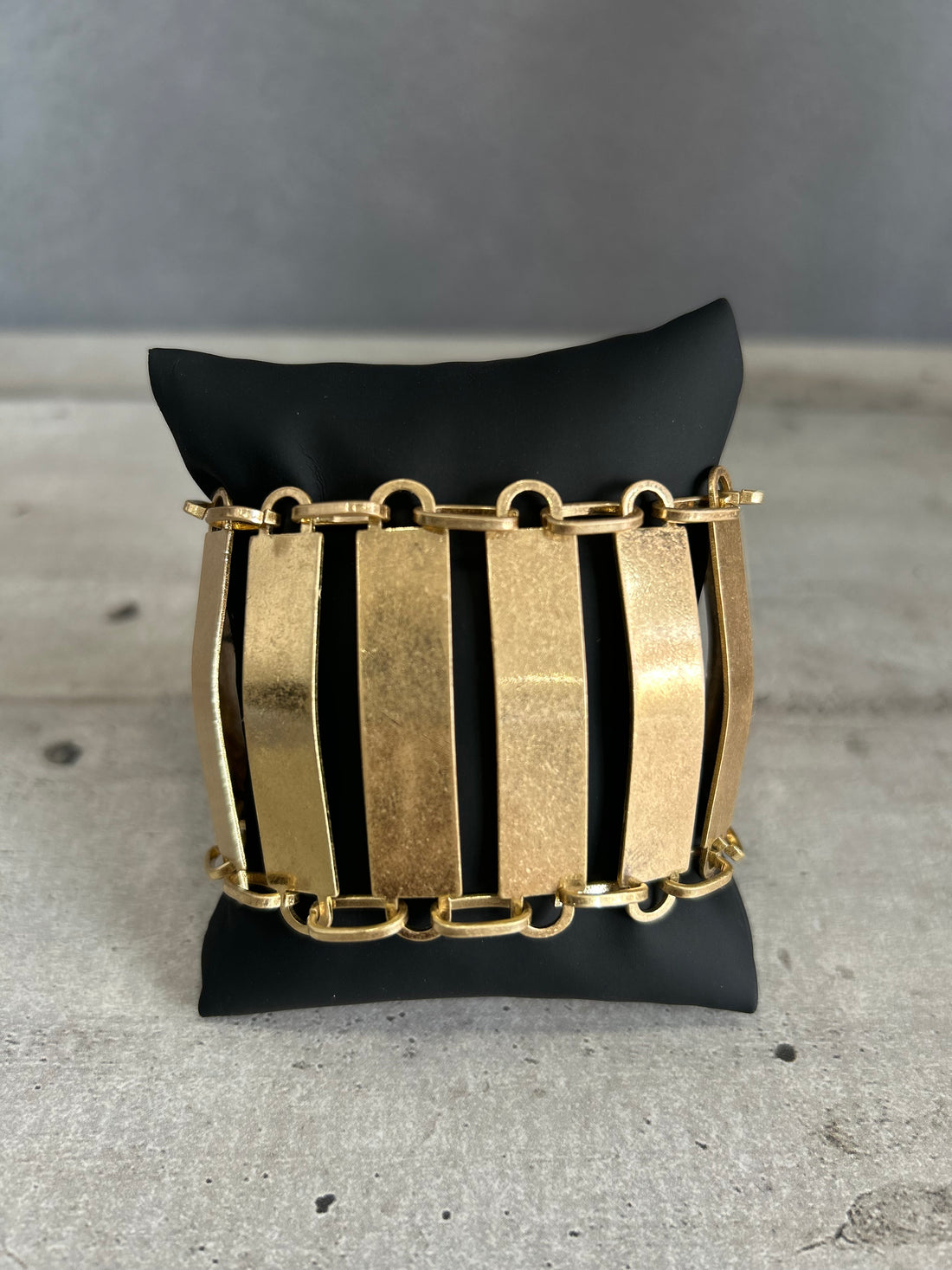 Bracciale a barre verticali in metallo dorato