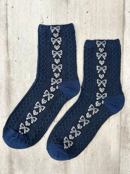 Calzini con fiocchi ricamati