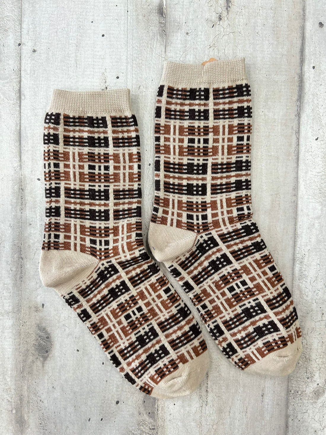 Calzini beige con motivo geometrico a quadri marroni e neri