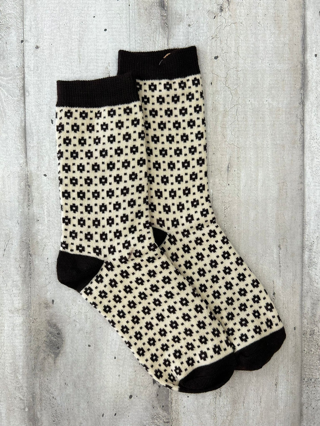 Calzini beige con motivo geometrico nero