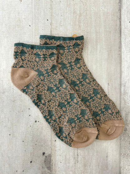 Calzini con motivo geometrico beige e verde