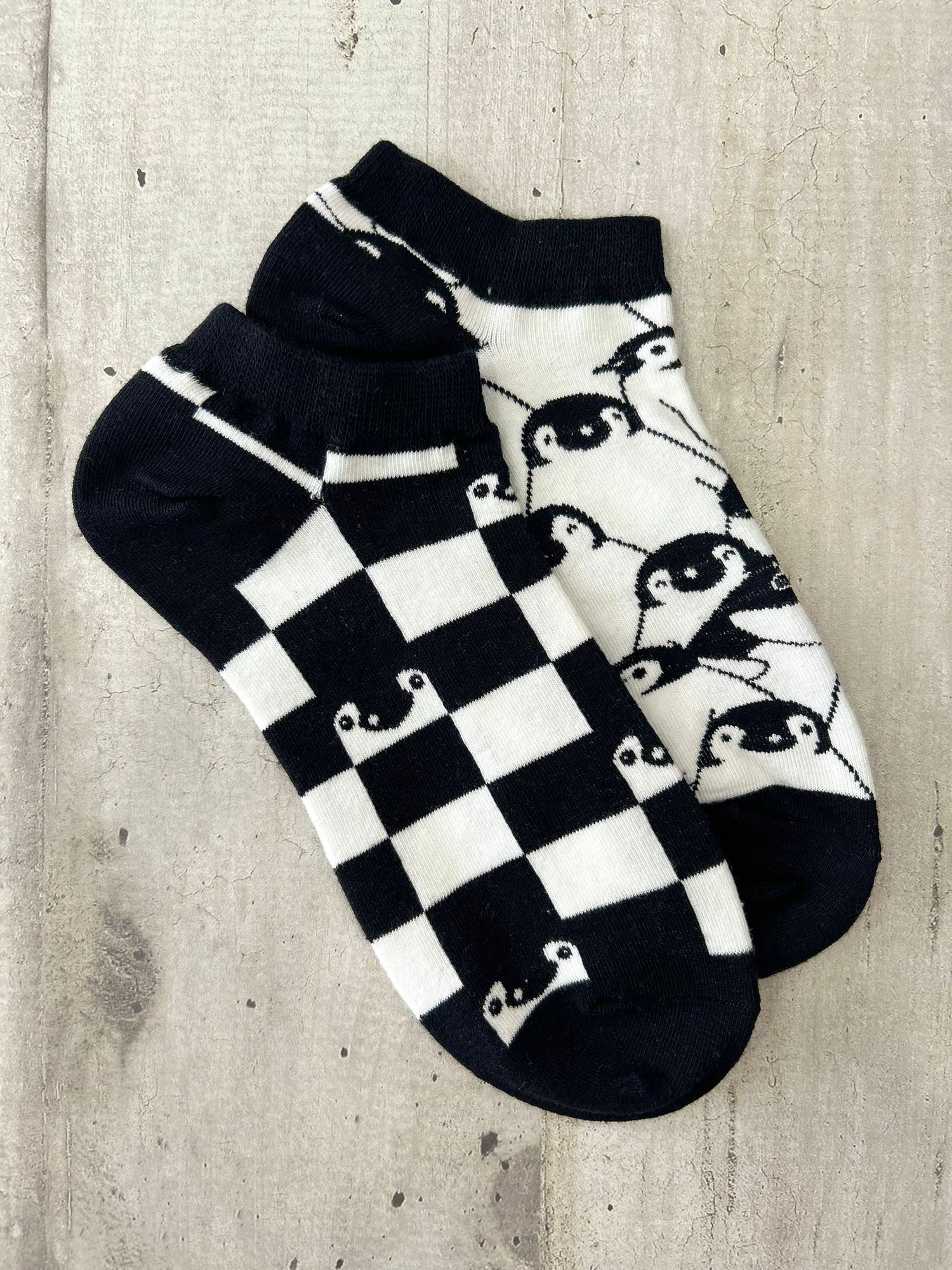 Calzini spaiati con pinguini