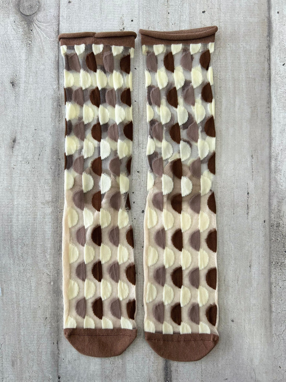 Calzini trasparenti con fantasia geometrica