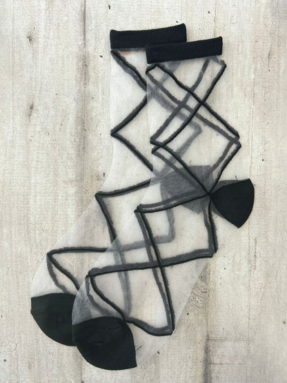Calzini trasparenti con motivo geometrico