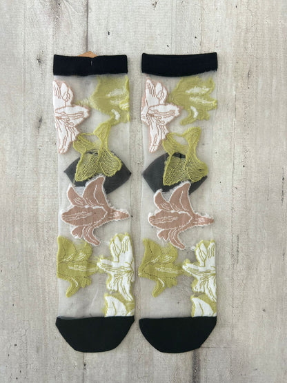 Calzini trasparenti con fiori ricamati