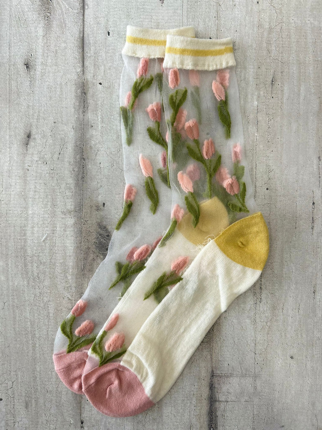 Calzini trasparenti con tulipani rosa 