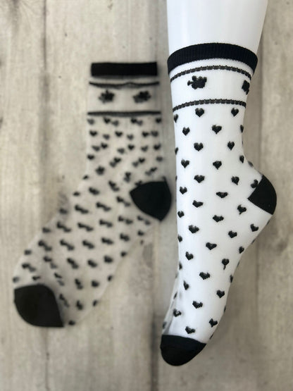 Calzini trasparenti con cuori neri