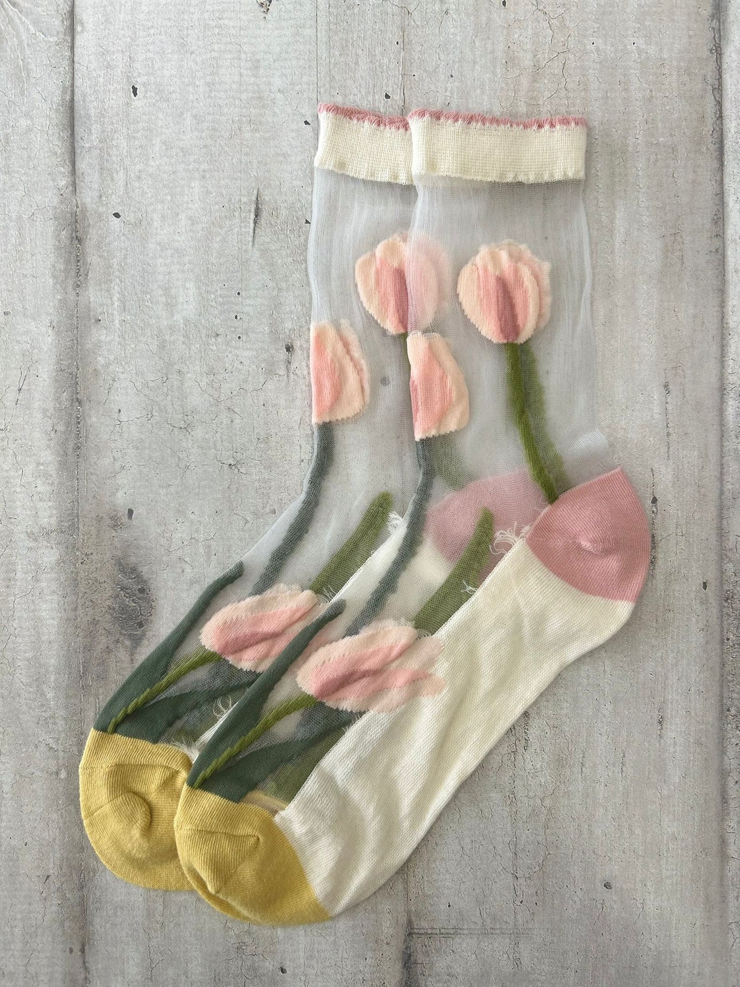 Calzini trasparenti con tulipani